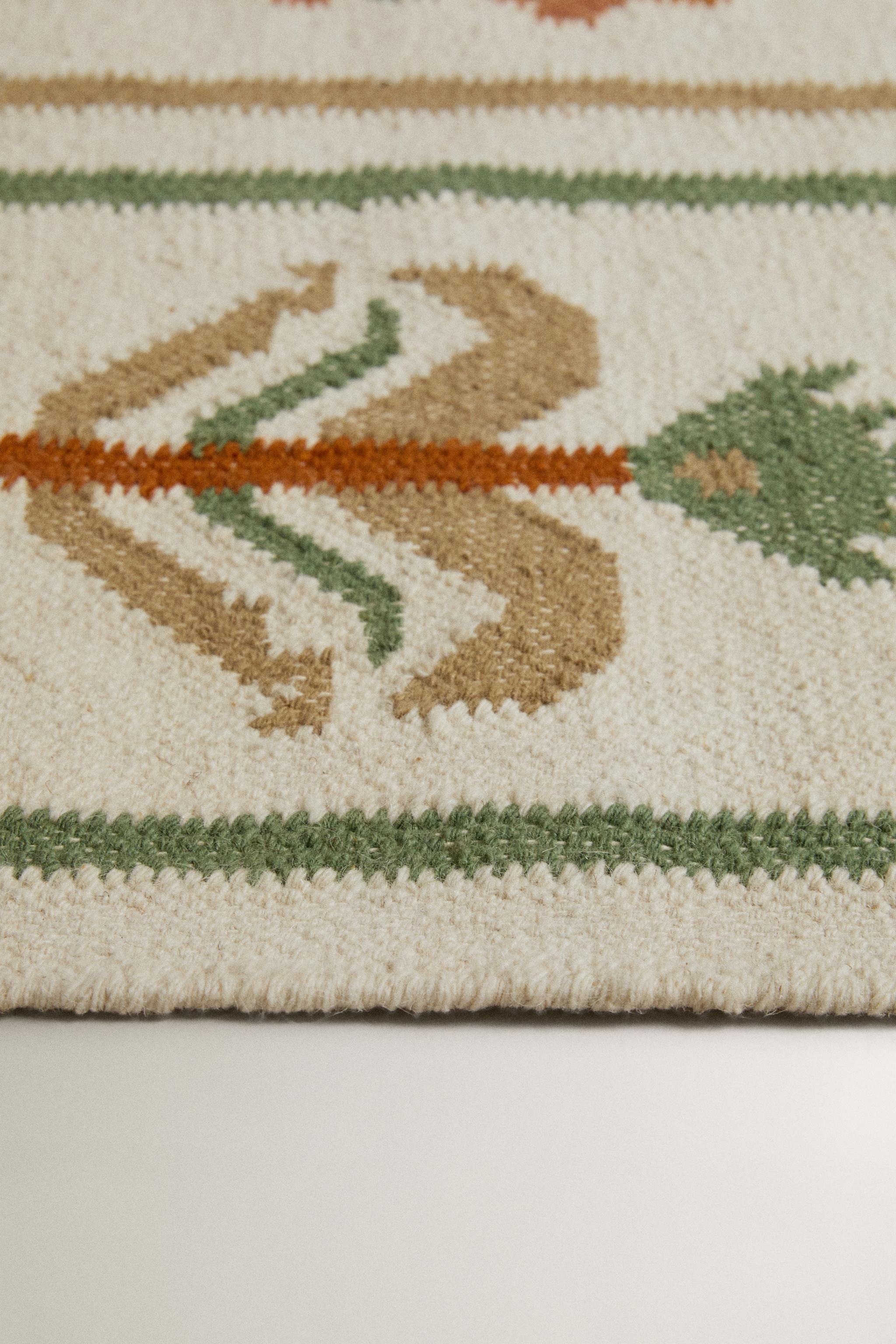 FLORAL WOOL AREA RUG